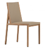 Light and elegant, the Flora contemporary chair blends modern natural oak wood style with organic curves and delicate proportions